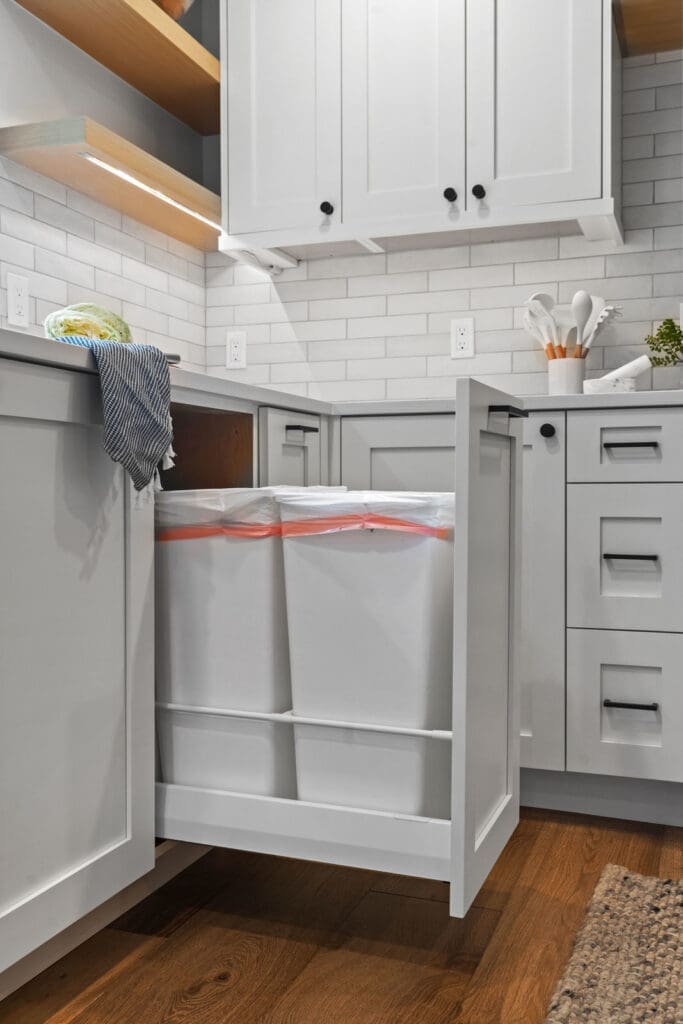 cabinets with boxes on opened drawers