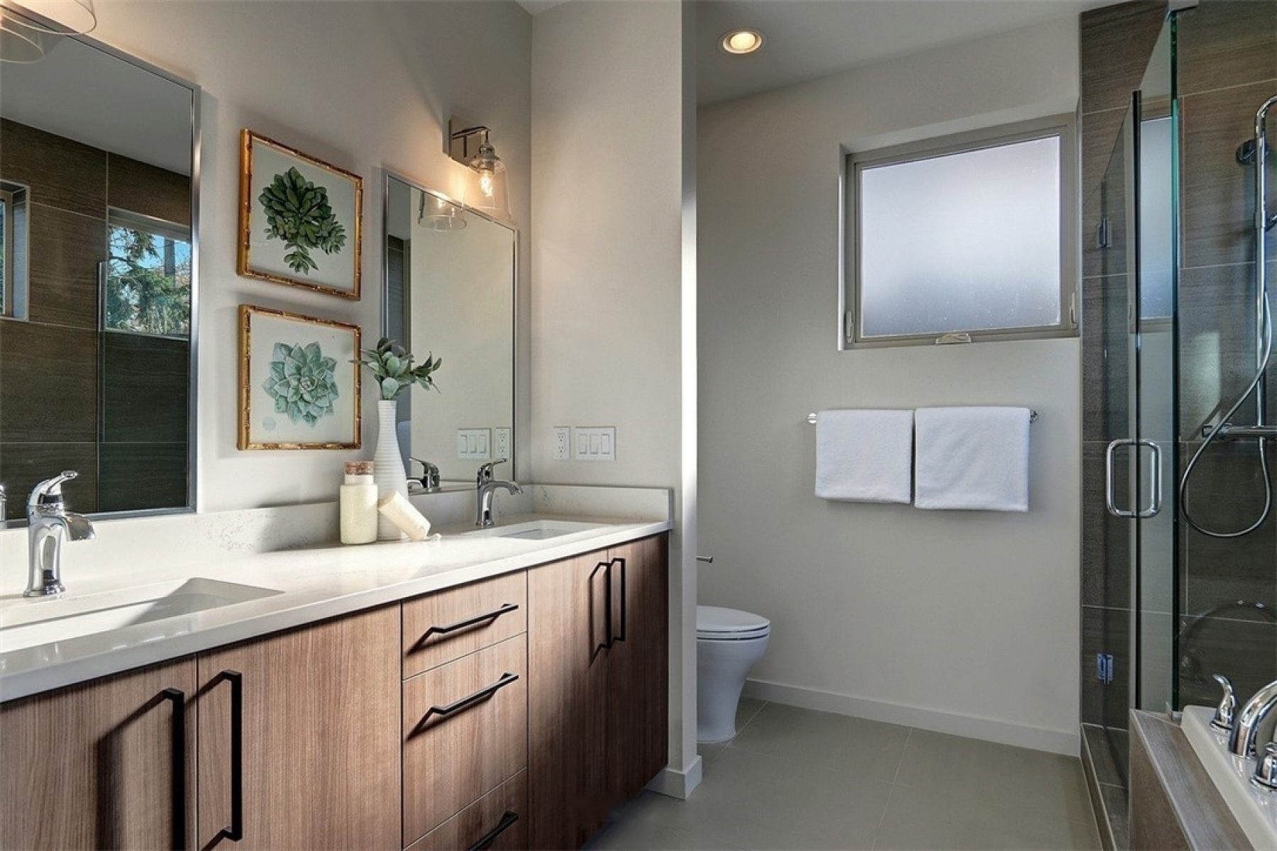 bathroom with towels and cabinet